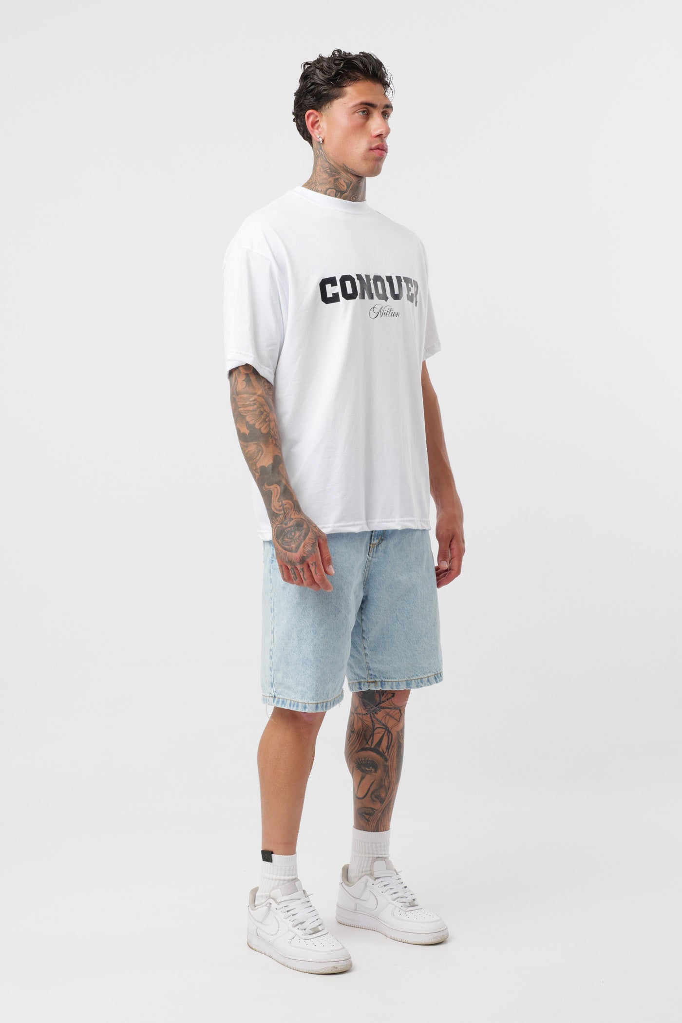 T-shirt Conquer Branca