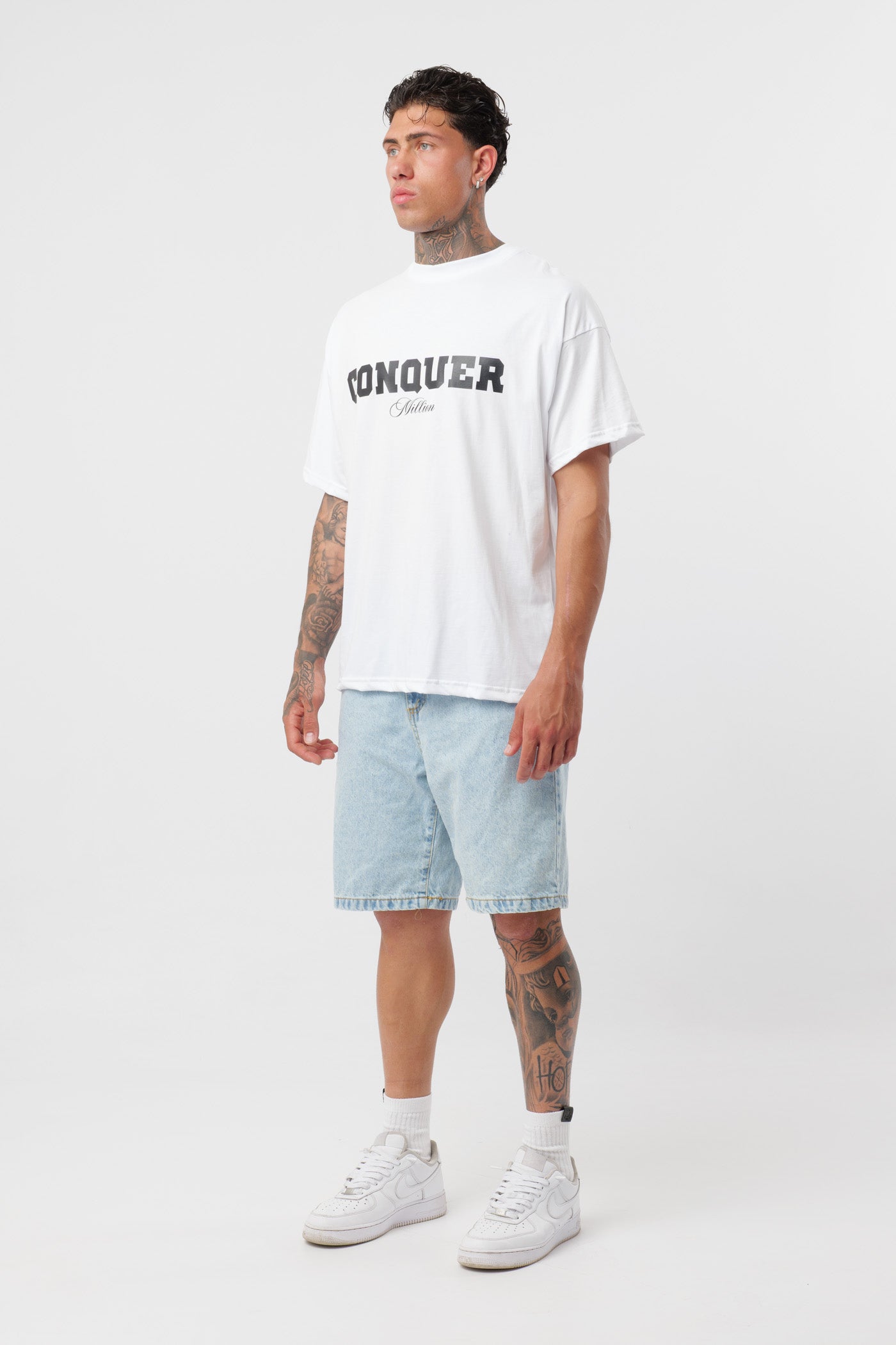 T-shirt Conquer Branca