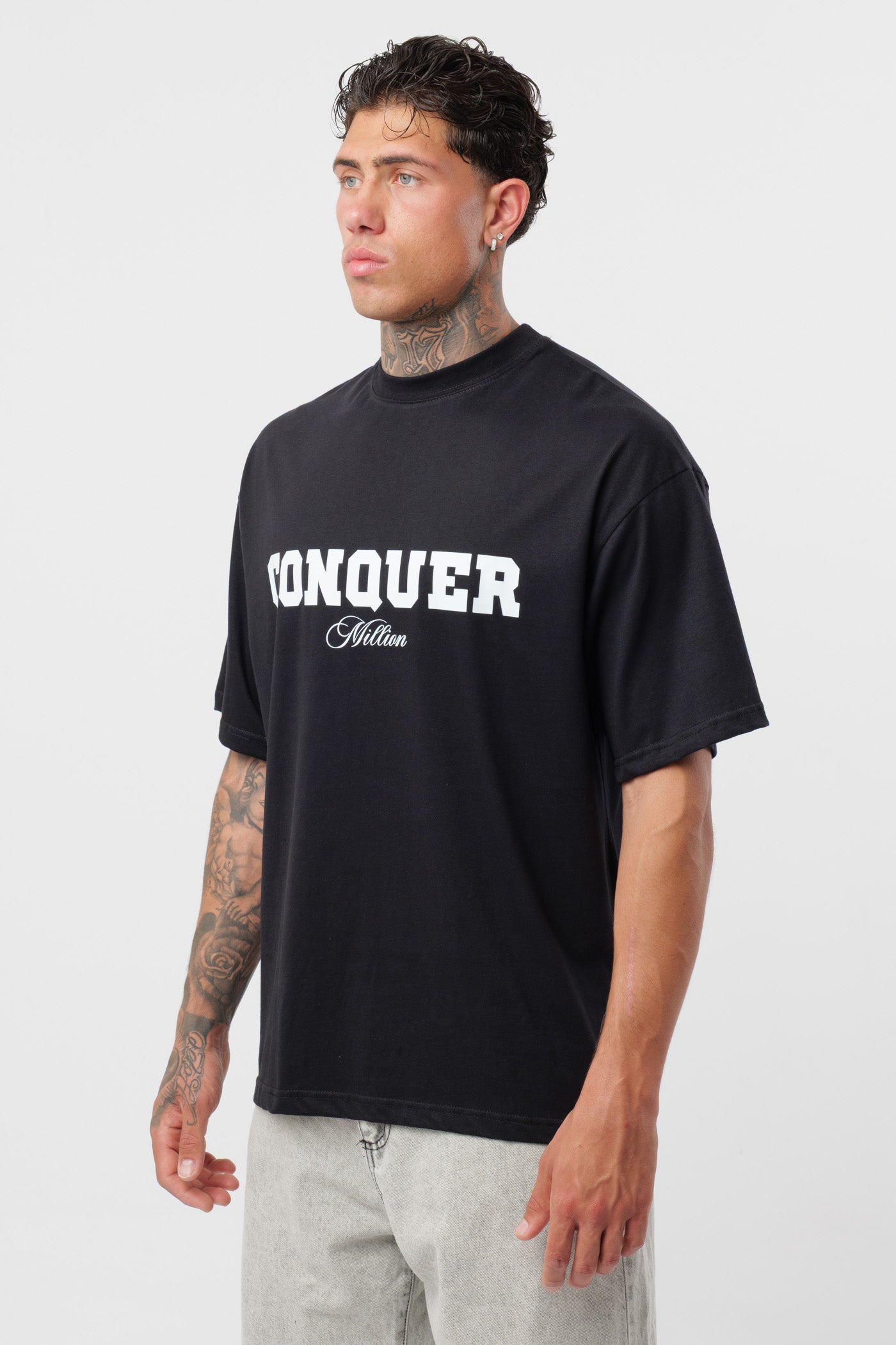T-shirt Conquer Preta